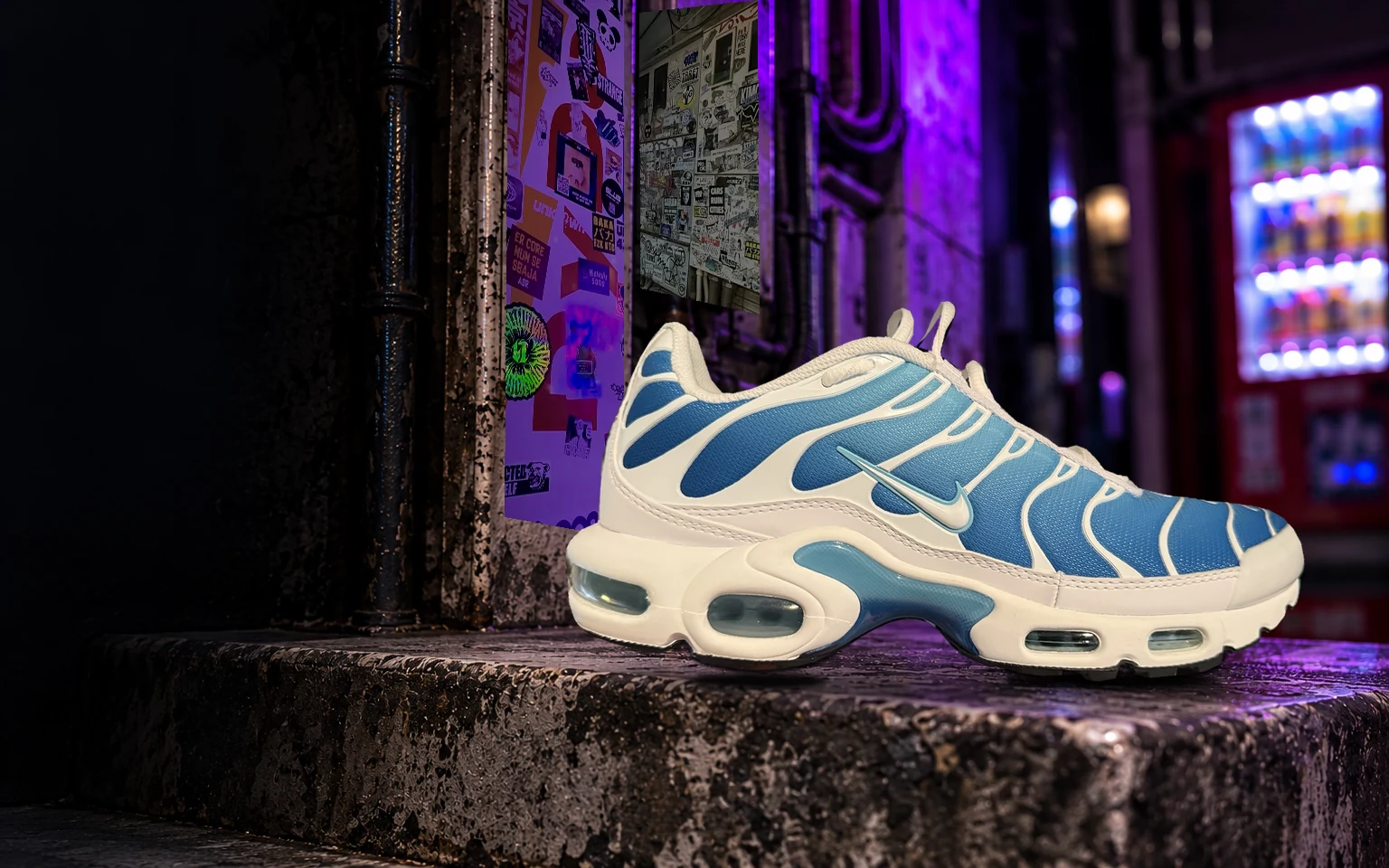 ShoesBRUH brand artwork: a blue-and-white Air Max Plus in a purple-lit alley.